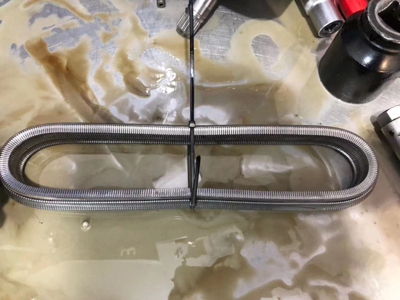 日產(chǎn)系列CVT變速箱進水后導致變速箱損壞，變速箱油變質(zhì)發(fā)白，檢修波箱